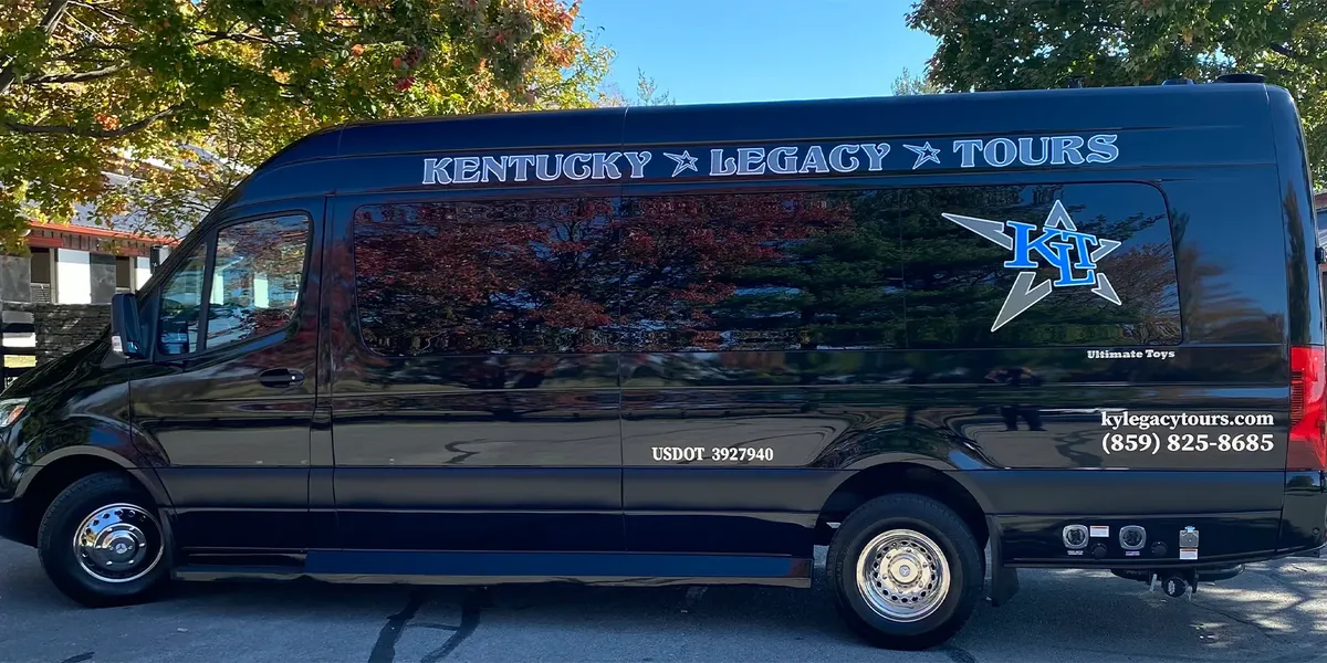A Kentucky Legacy Tours van on the road in Kentucky