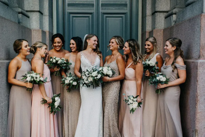 A wedding party arriving by luxury van